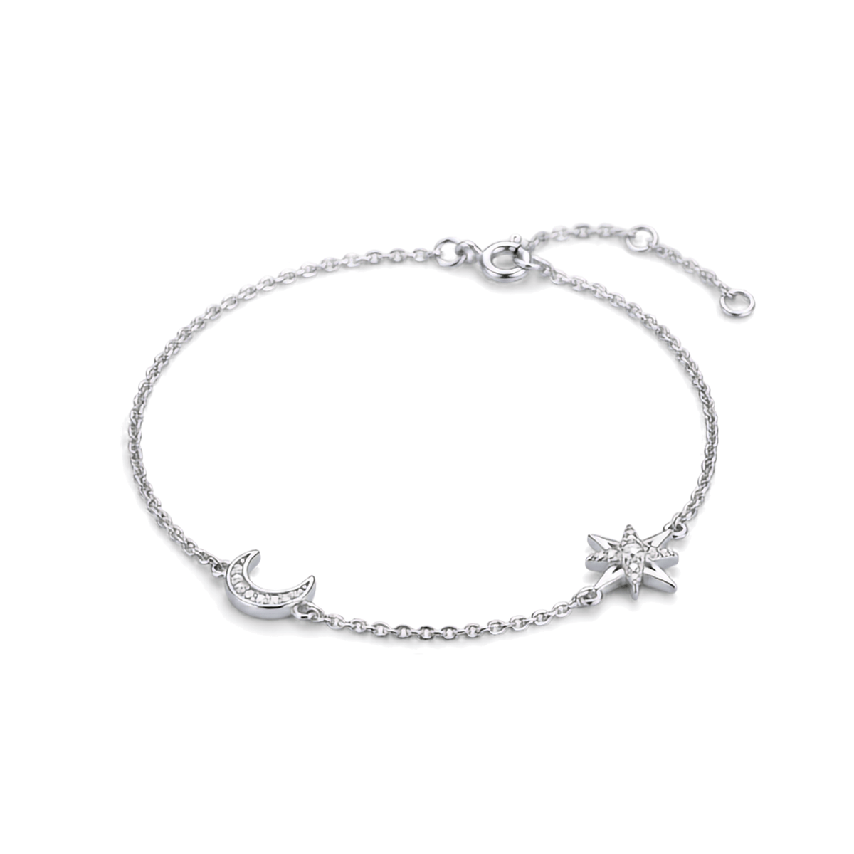 A delicate silver chain bracelet featuring a crescent moon and a starburst charm, both adorned with small clear crystals, displayed on a clean white background.