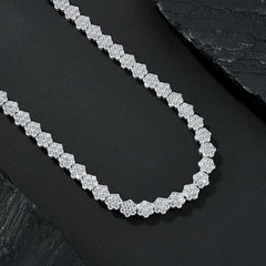 Diamond necklace on a black stone surface