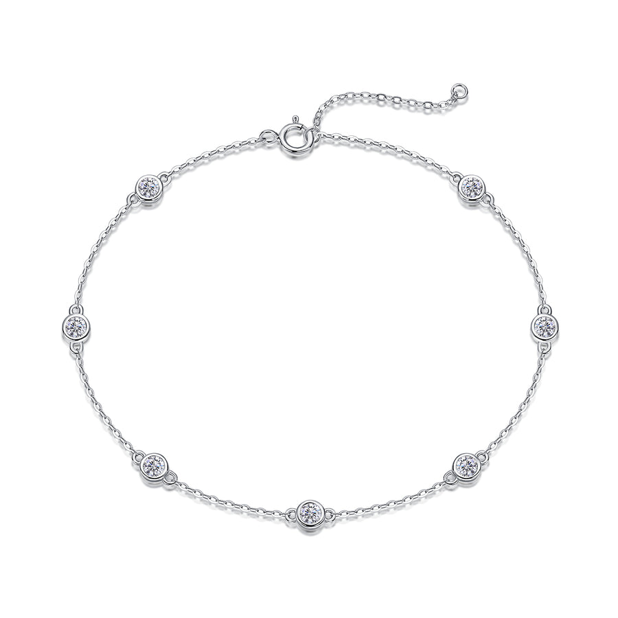 Silver bracelet with small round diamonds on a white background