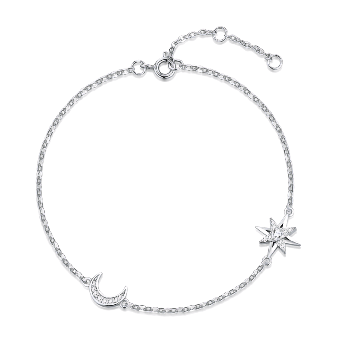 A delicate silver chain anklet featuring a crescent moon and starburst charm, embellished with small clear crystals, shown on a plain white background.