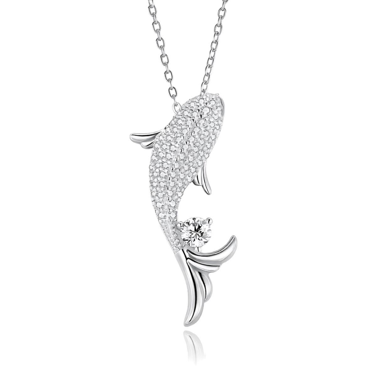 A silver-toned fish pendant necklace paved with small clear stones, with a single round clear gemstone near the tail, shown on a white background with a faint reflection below.