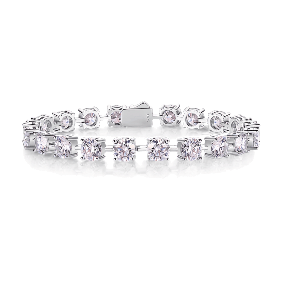 A silver tennis bracelet featuring round-cut clear gemstones in a prong setting, displayed on a clean white background.