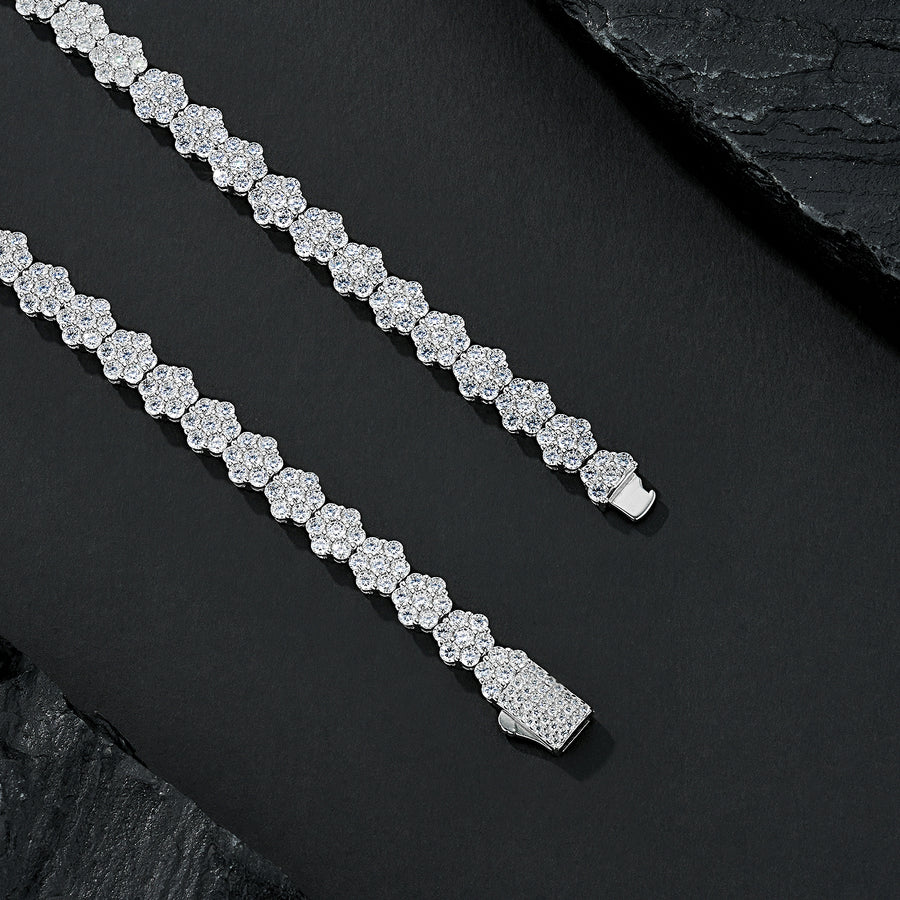 Silver bracelet with clear stones on a dark surface