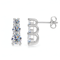 A pair of silver stud earrings with three marquise-cut clear crystals, shown from the front and side on a white background.