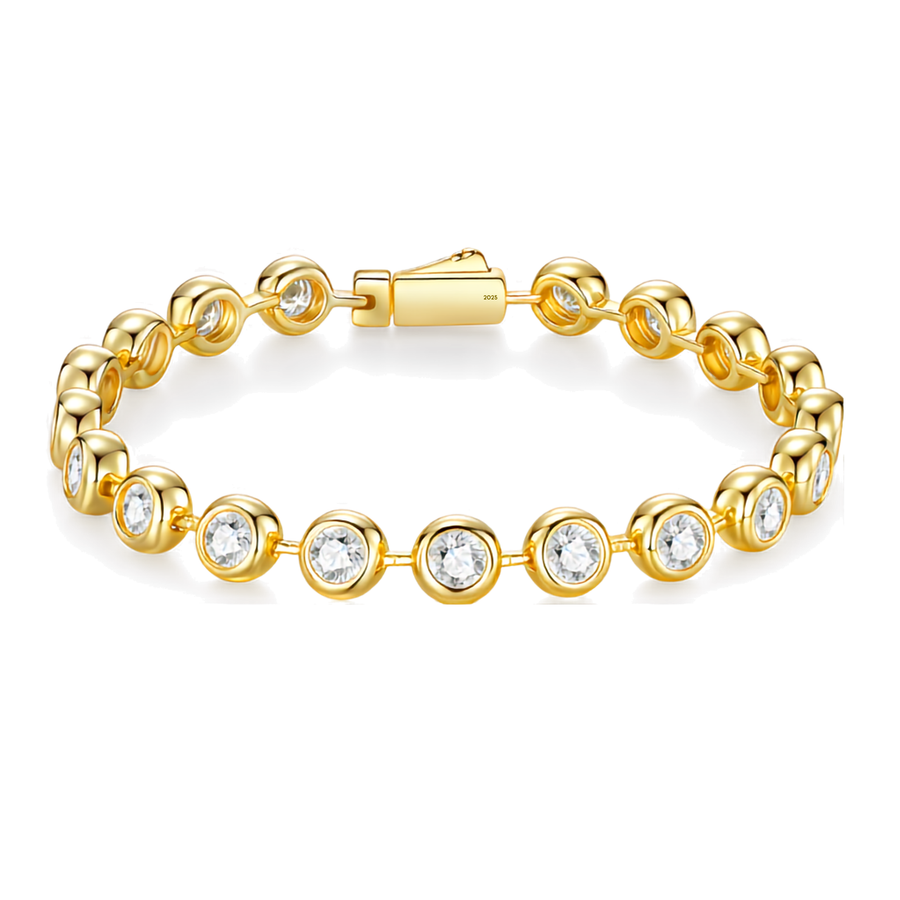 A gold tennis bracelet featuring round bezel-set clear gemstones, displayed on a clean white background.