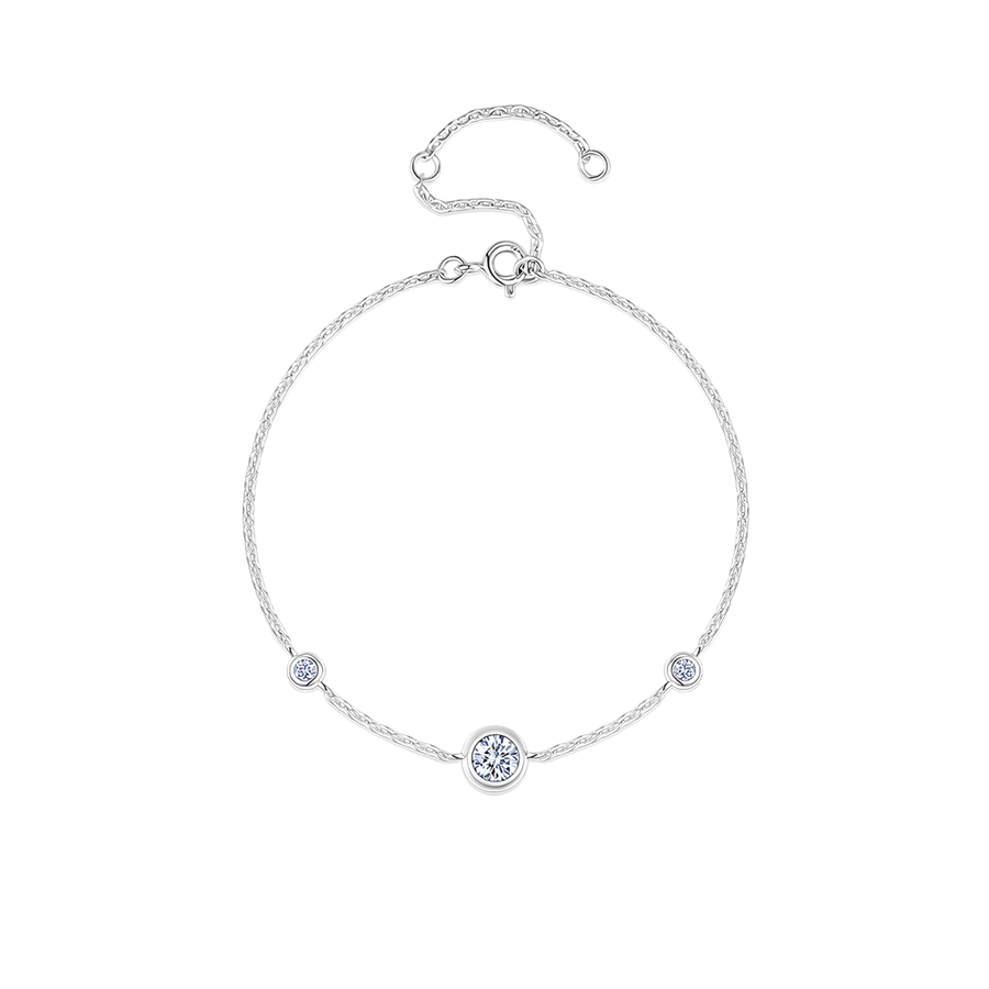 A delicate silver chain bracelet with three bezel-set round clear stones, featuring a larger central round stone and two smaller accent stones, displayed on a clean white background.
