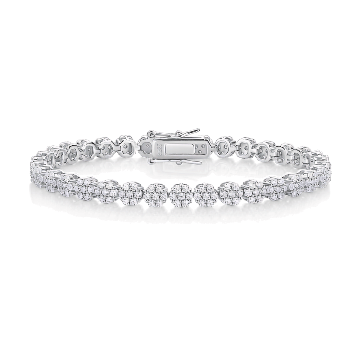 A silver tennis bracelet featuring a double row of round-cut diamonds in a pave setting, with a polished clasp closure, displayed on a clean white background.